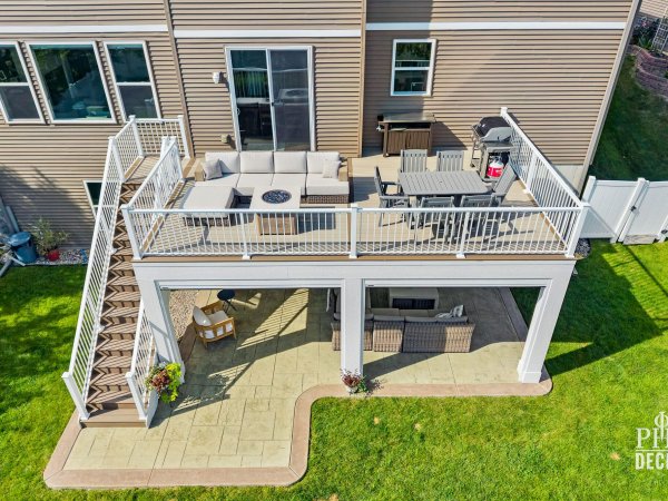 Aerial view of The Oakview Deck with white railing, Weathered Oak decking, stairs, and a covered patio below.