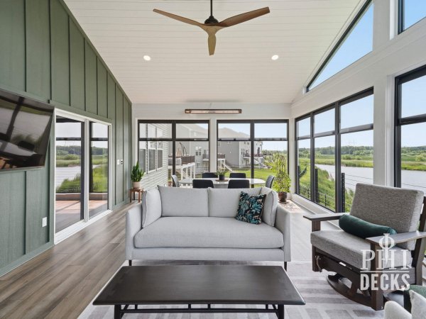 Pondview Porch interior with Xtend windows, vaulted ceiling, and pond views in Rogers, Minnesota