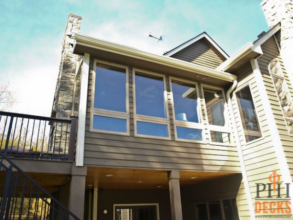 four-season-porch-finished-under-deck-stone-fireplace-PHI