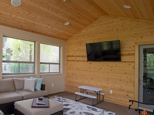 outdoor_tv_screen_porch_cedar_wall