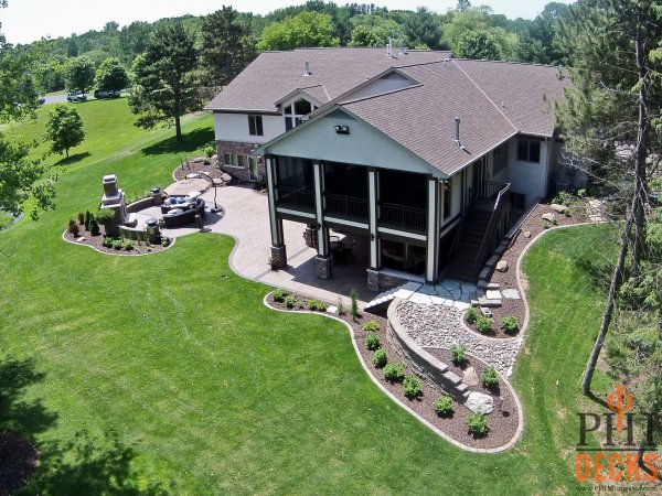 party_retaining_wall_mulch_trex_spiral_porch_deck