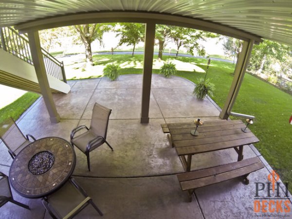 stamped-colored-concrete-patio-below-deck